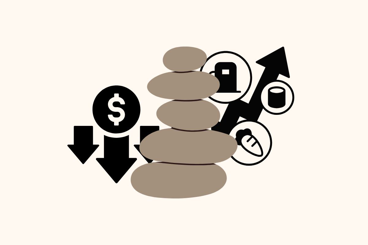  Gemini said An illustration symbolizing inflation and economic balance, featuring a central stack of five smooth, balanced stones. To the left, a dollar sign icon is positioned above three downward-pointing black arrows, indicating a decrease in currency value. To the right, icons for fuel, canned goods, and a carrot are positioned along a jagged upward-pointing black arrow, representing the rising cost of essential goods.
